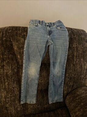 Levi's light blue denim with red logo waistband